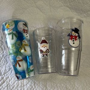 Three Christmas tervis tumblers.